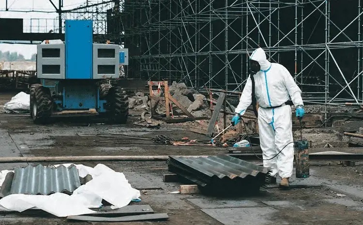 someone working in a tyvek coveralls